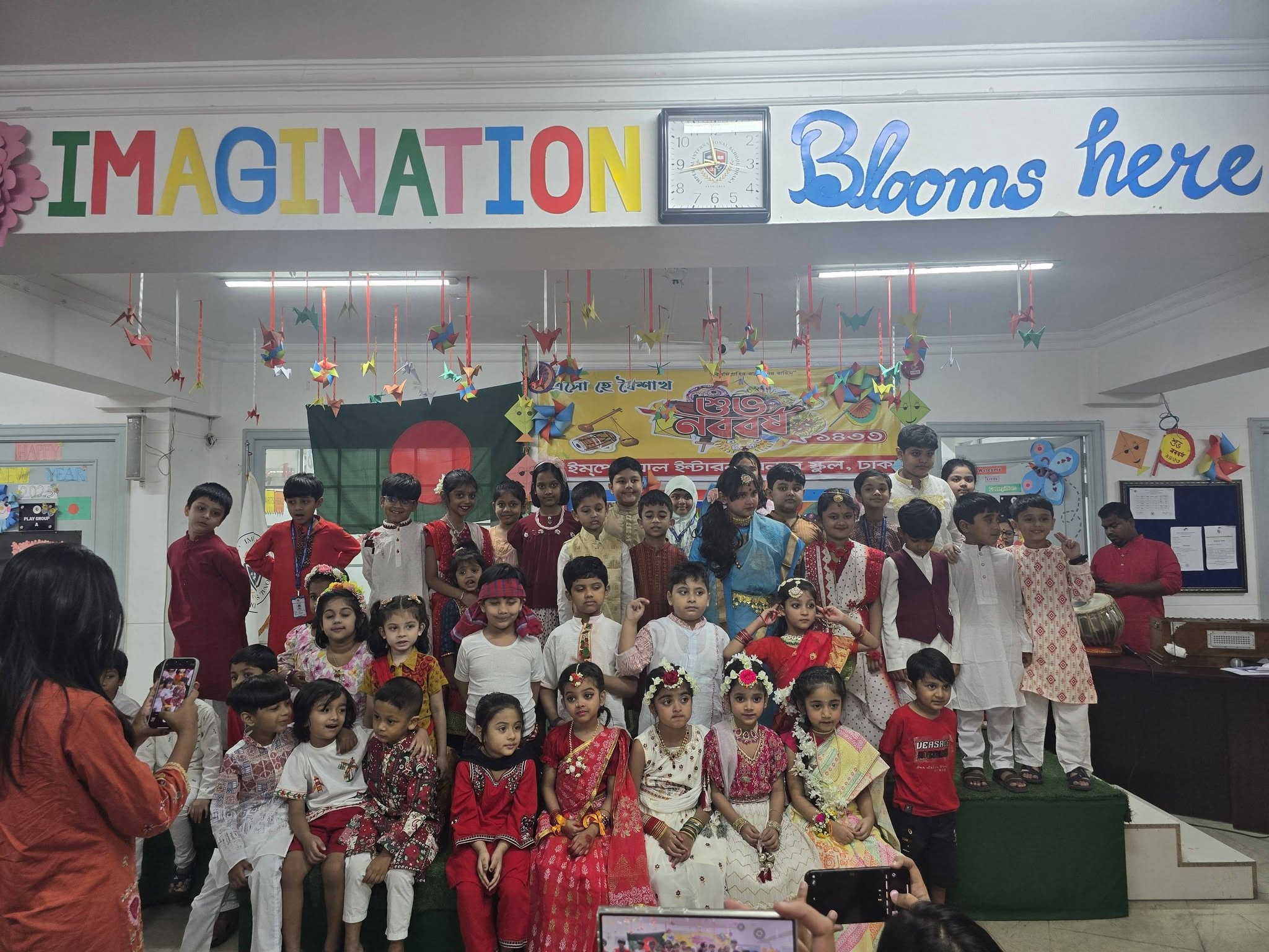 Students and teachers at a school assembly